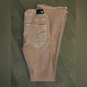 Super super stretch bootleg jeans more of a peachy pink color